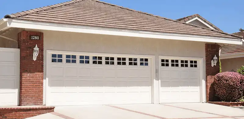 Residential garage door repair service for a double garage door in Savannah, GA