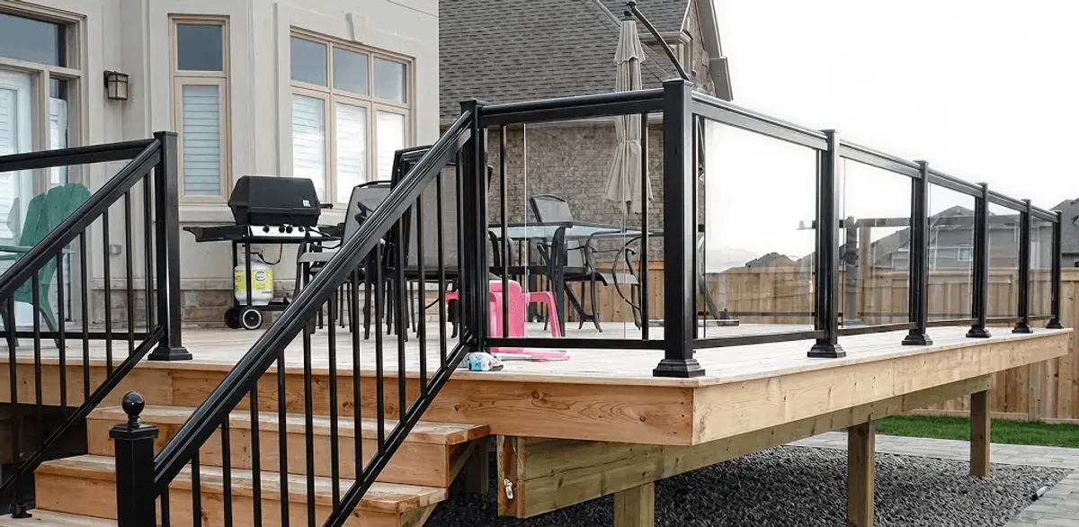 Handrail installation on a deck staircase for safety and code compliance in Savannah, GA