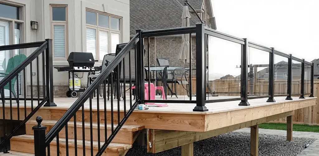 Handrail installation on a deck staircase for safety and code compliance in Savannah, GA